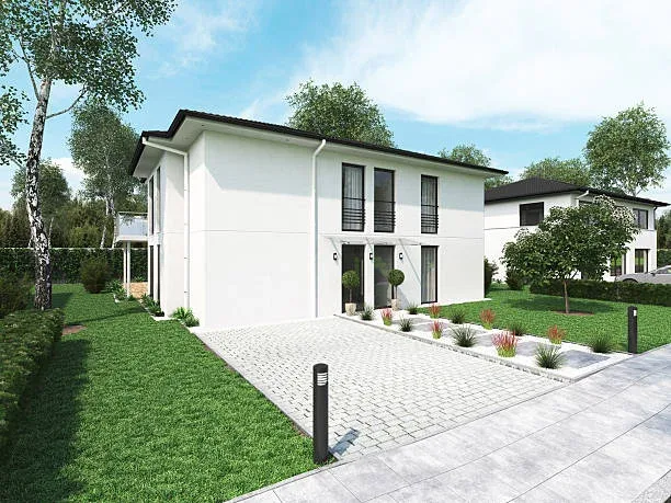 Modern home with a concrete driveway in Wellington